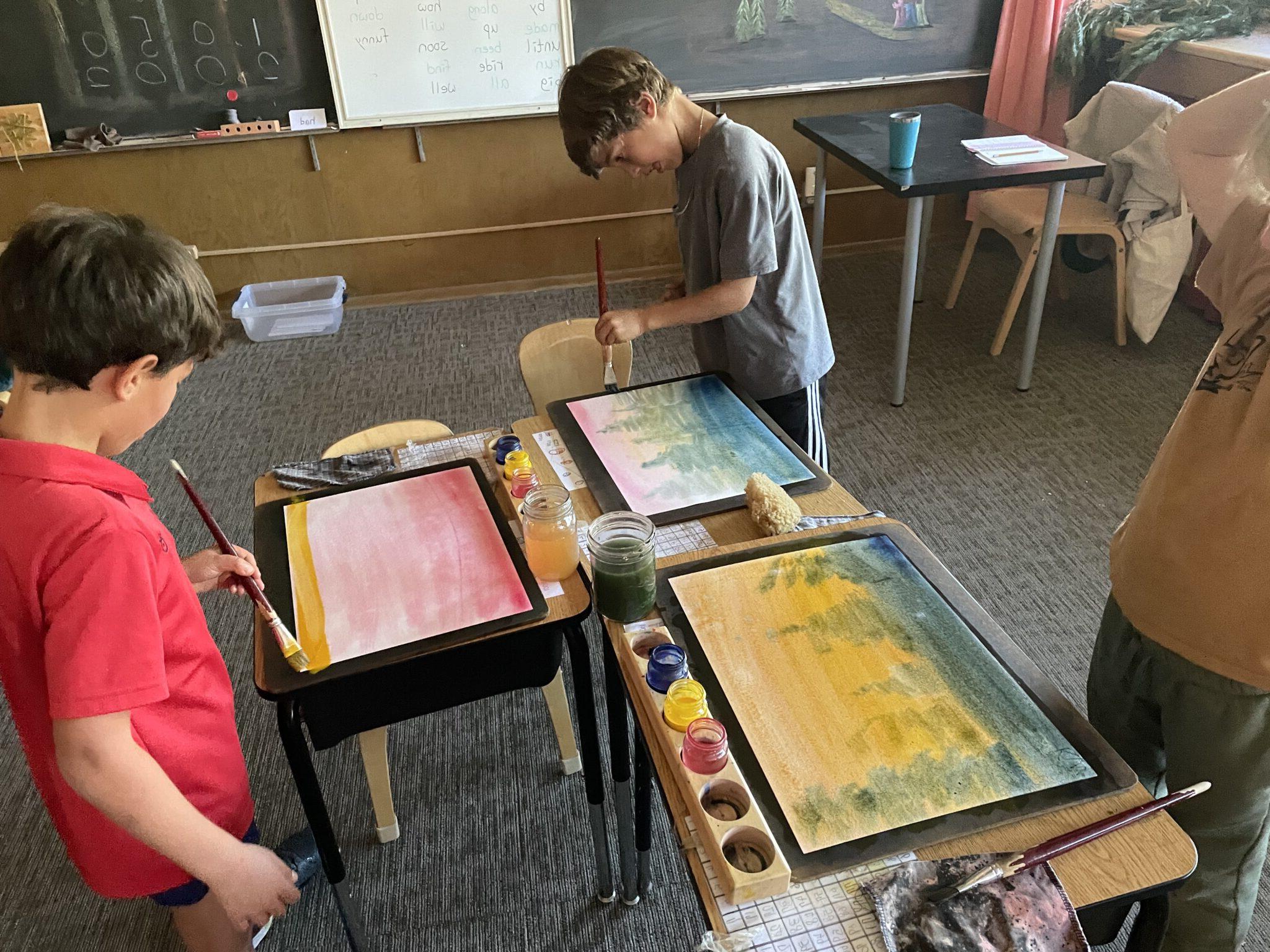 colorful paintings created by Waldorf School Orange County second graders.